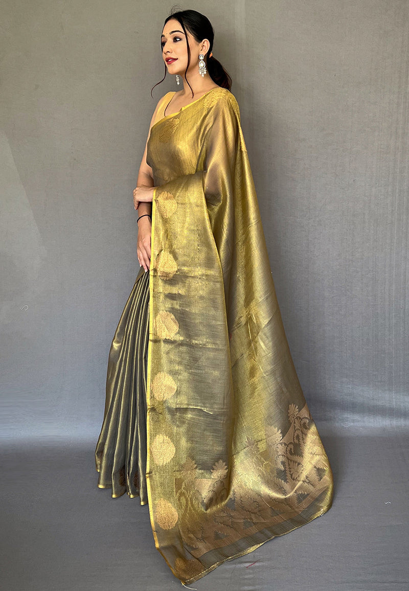 Deep Black draped with a stunning Rich Golden Saffa Tissue Saree With Unstitched Blouse