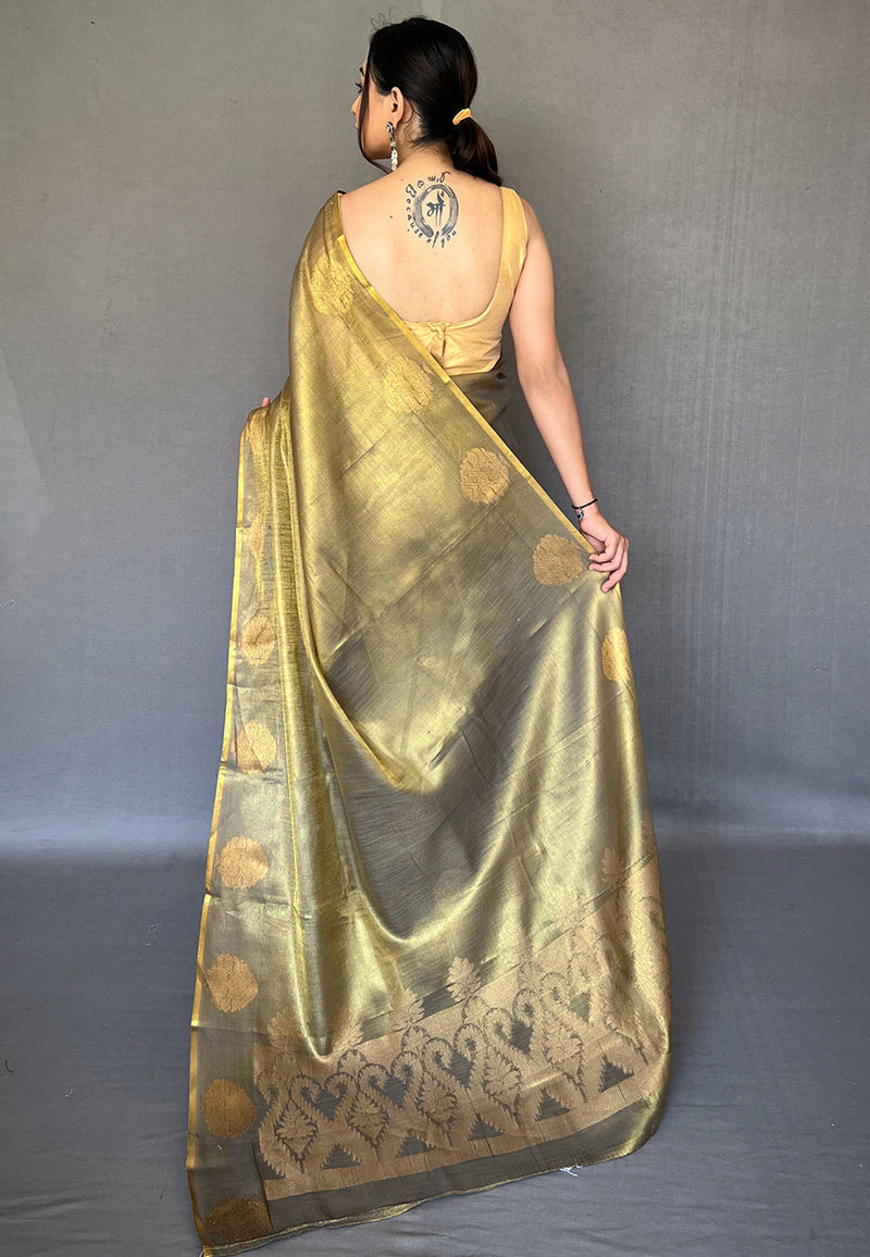 Deep Black draped with a stunning Rich Golden Saffa Tissue Saree With Unstitched Blouse